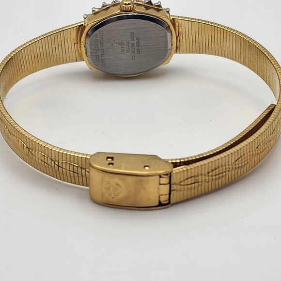 Vintage Elgin Gold Tone Ruby & White Sapphire Watch